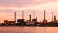 Petroleum oil refinery factory over sunrise Royalty Free Stock Photo