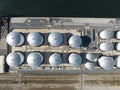 Petroleum oil storage silos. Refinery industrial oil tank container top down aerial drone view. Chemical liquid metal