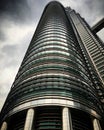 Petronas Towers skyscraper building against the stormy sky, Kuala Lumpur, Malaysia, March 2019 Royalty Free Stock Photo