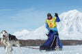 Running sled dog team musher Denis Ryabuhin. Kamchatka Sled Dog Racing Beringia Royalty Free Stock Photo