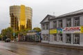 Glass, yellow Asia Pacific Bank building, Petropavlovsk-Kamchatsky, Russia.