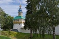 Petrovskaya Tower with fortress wall of Holy Dormition Pskovo-Pechersky Monastery. Pechory, Russia Royalty Free Stock Photo