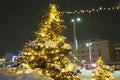 Petrozavodsk, Karelia, Russia, 01.13.2024: Gagarin Square, view of Lenin Avenue, Christmas trees. Winter evening or