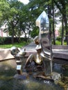 Petrozavodsk, Karelia, Russia / October 12, 2019: a fountain in the city square, depicting three figures - father, mother and