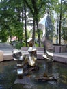 Petrozavodsk, Karelia, Russia / October 14, 2019: a fountain in the city square, depicting three figures - father, mother and Royalty Free Stock Photo