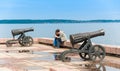 Petrozavodsk, Republic of Karelia, Russia, August 05, 2013: Couple in love between two old cannons on Onega embankment