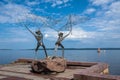 Petrozavodsk, Republic of Karelia, Russia, August 05, 2013: `Fishermen` - sculpture on Onega embankment