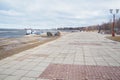 Petrozavodsk, Russia, 04.14.2024: City historical granite embankment of Lake Onega. Sights of the capital of Karelia