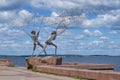 Sculpture `Fishermen` on the embankment of Onega lake