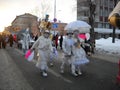 Petrozavodsk / Russia - November 20, 2019: festive procession through the city streets in winter. Living monuments and people in