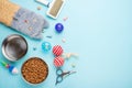 Pets and cute animals, pets, cute cats, food and accessories for cat`s life, Flat lay, space for a dresser, on a blue background.