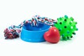 Pets are friends concept. Pet bowl and rubber toys Royalty Free Stock Photo