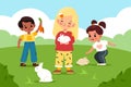 Petting zoo. Children take care rabbits in green clearing, kids play and contact small animals outdoor, boys and girls