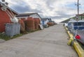 A Man Sitting on the Dock at Petty Harbour