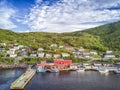 Petty Harbour with two piers during summer sunset, Newfoundland, Canada Royalty Free Stock Photo