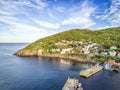 Petty Harbour with two piers during summer sunset, Newfoundland, Canada Royalty Free Stock Photo