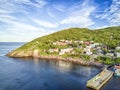 Petty Harbour with two piers during summer sunset, Newfoundland, Canada Royalty Free Stock Photo