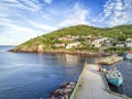 Petty Harbour with two piers during summer sunset, Newfoundland, Canada Royalty Free Stock Photo