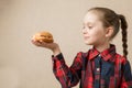 Petty Little Girl eating burger, following fastfood - Image