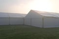 Marquees in the morning mist.
