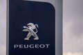 Peugeot company logo near automobile centre. Royalty Free Stock Photo