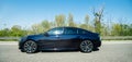 Peugeot 508 limousine with brilliant black color French highway