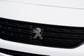 Peugeot lion detail front sign of car white chrome logo of french manufacturer