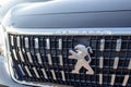 Peugeot logo on the front of a new SUV