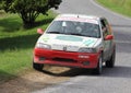 A Peugeot 106 rally car at the Alba Rally on 28 July 2019