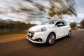 Peugeot 208 on the road