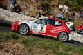 A Peugeot 206 WRC racing car during a timed speed trial in the second edition of the Ronda Di Albenga race that takes place ever
