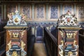 Pew with rich ornate colorful woodwork in the chapel of Kronborg Slot castle in Helsingor, Denmark