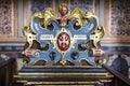 Pew with rich ornate colorful woodwork in the chapel of Kronborg Slot castle in Helsingor, Denmark