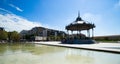 Peynet kiosk in Valence with reflection on the pond water