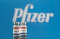 Pfizer Coronavirus vaccine.Vaccine close up.Pfizer logo in the background.