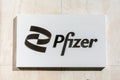 Pfizer sign, logo on the facade of pharmaceutical and biotechnology corporatio