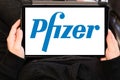 Pfizer sign text and brand logo of Pharmaceutical Corporation on tablet screen computer