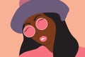 Abstract face portrait of a girl with tanned skin in hat and sunglasses. Royalty Free Stock Photo