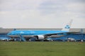 PH-BQb KLM Asia Boeing 777 idle on landing strip Aalsmeerbaan of Amsterdam Schiphol Airport in the Netherlands, parked due to canc Royalty Free Stock Photo