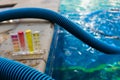 PH Test Kit on swim pool river water inspector Royalty Free Stock Photo