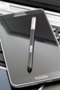 Phablet with selective focus on stylus pen Royalty Free Stock Photo