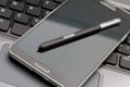 Phablet with selective focus on stylus pen Royalty Free Stock Photo