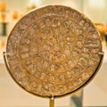 Phaestos disk with unknown script exibited at Heraklion archaeology museum, island of Crete