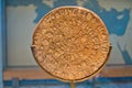 Phaestos disk with unknown script exibited at Heraklion archaeology museum, island of Crete