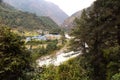 View of Phakding Village and the Dudh Koshi River, Khumbu, eastern Nepal, along the Everest Base Camp trek Royalty Free Stock Photo