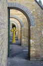 Celtic cross is hanging in exterior church arcade