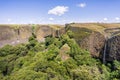 Phantom Waterfall dropping off over vertical basalt walls, North Table Mountain Ecological Reserve, Oroville, California