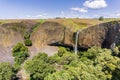 Phantom Waterfall dropping off over vertical basalt walls, North Table Mountain Ecological Reserve, Oroville, California