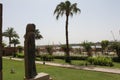 Pharaoh statue looking at the Nile river in Luxor, Egypt