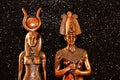 Pharaoh Tutankhamun with the goddess ISIS on a black background. Egyptian history
